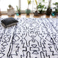 a silk hand knotted rug