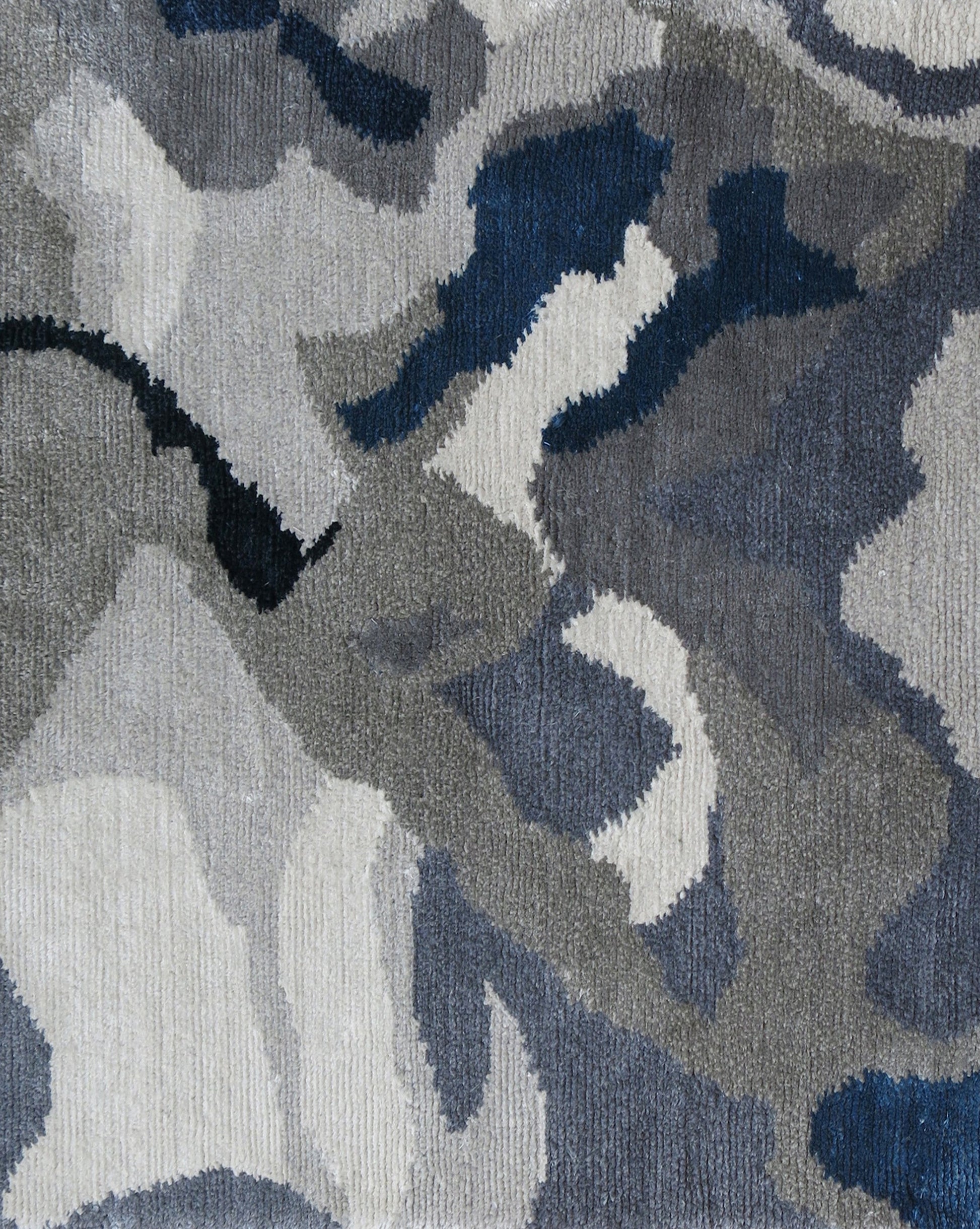 A Mallee Hand Knotted Rug||Slate from the Presidio Collection by Eskayel with a grey and blue camouflage pattern.