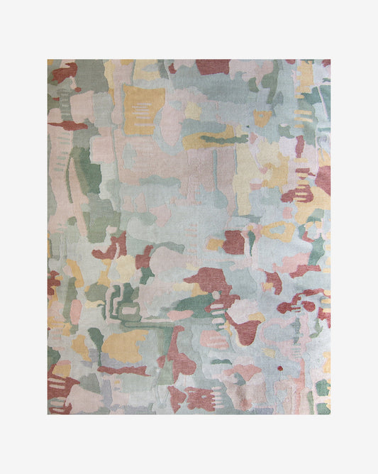 A multicolored abstract design is featured on a Kotoubia Flatweave Rug, inspired by the High Atlas region