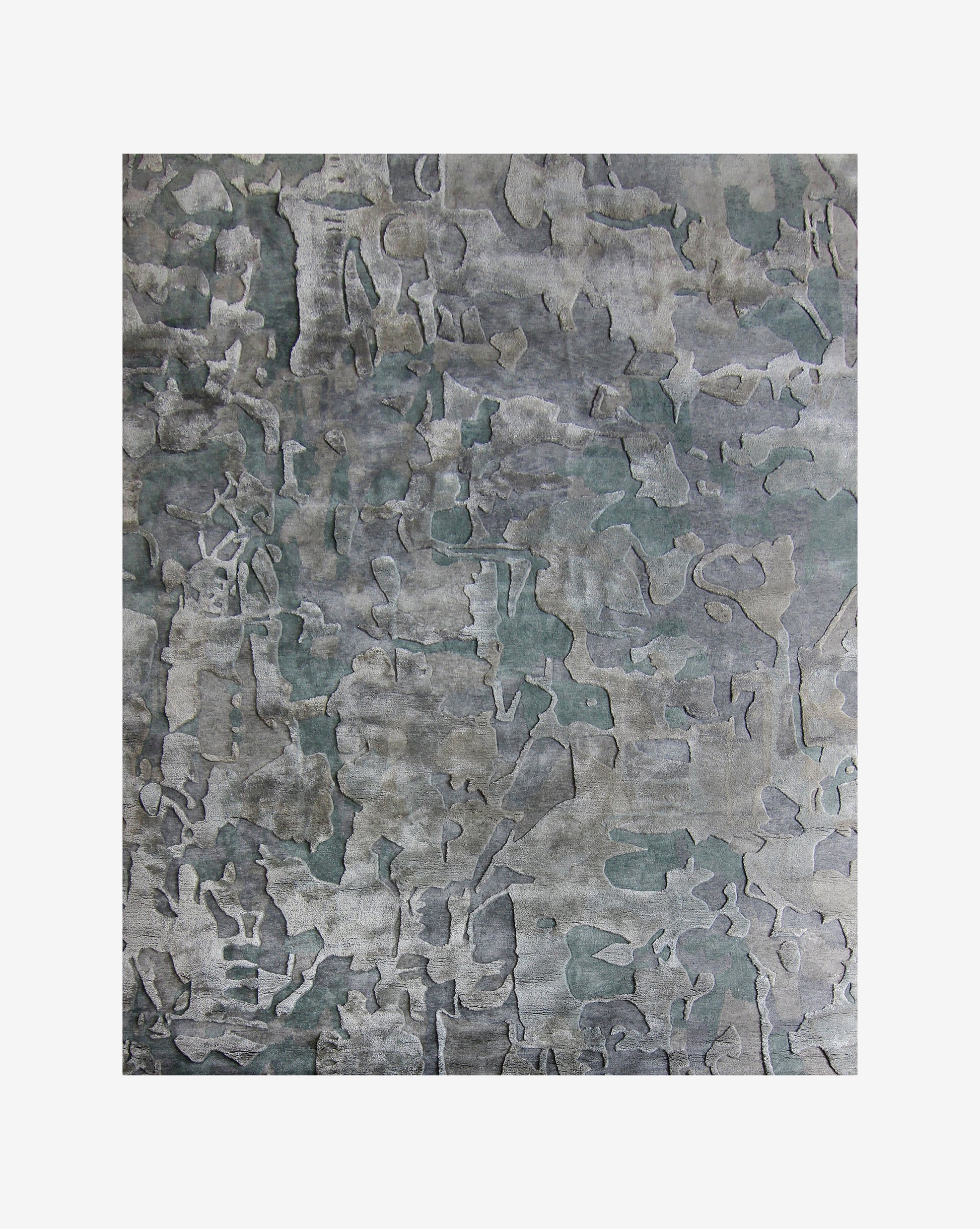 A grey and green Kotoubia Hand Knotted Rug with a camouflage pattern