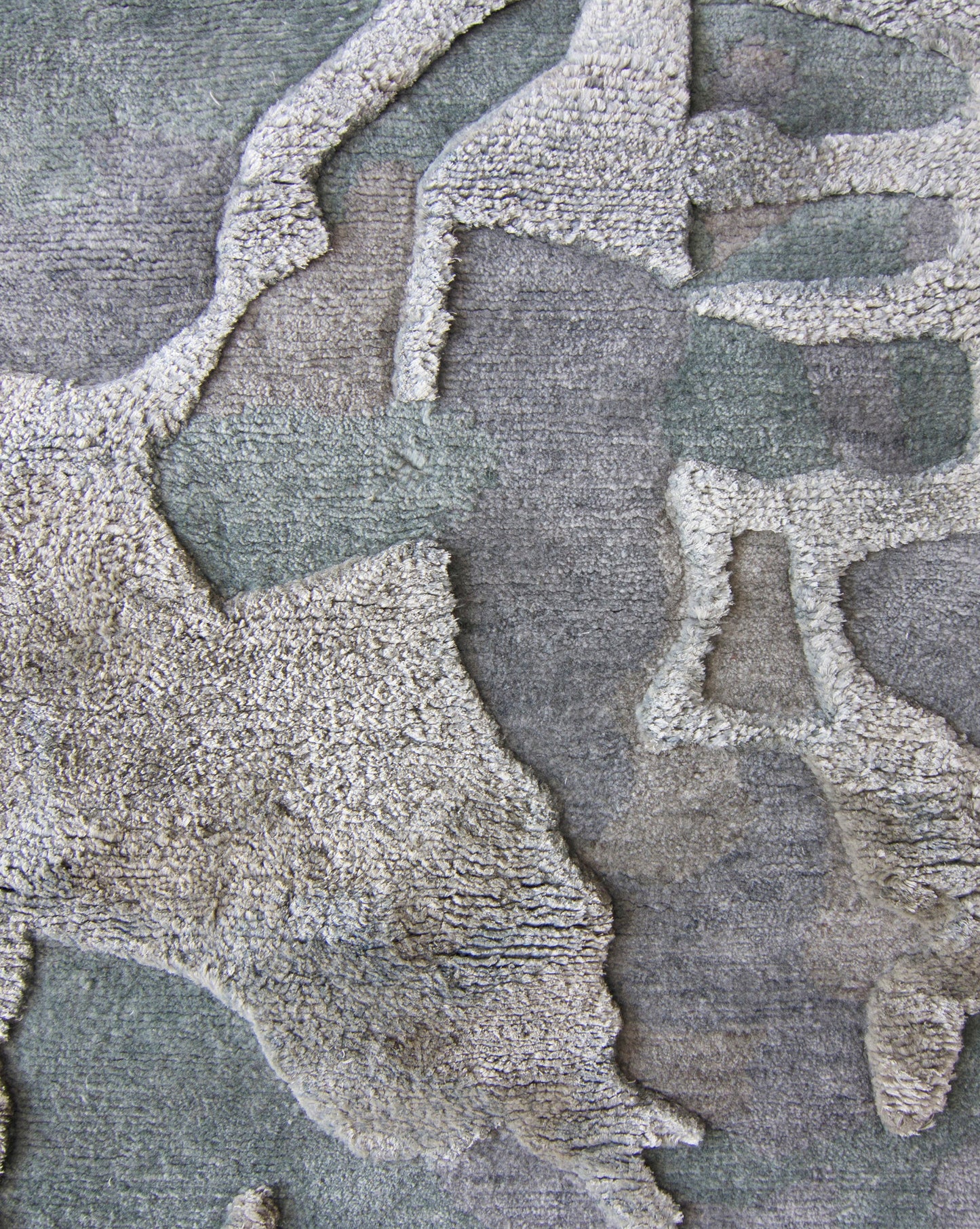 An image of a Kotoubia Hand Knotted Rug with a pattern on it