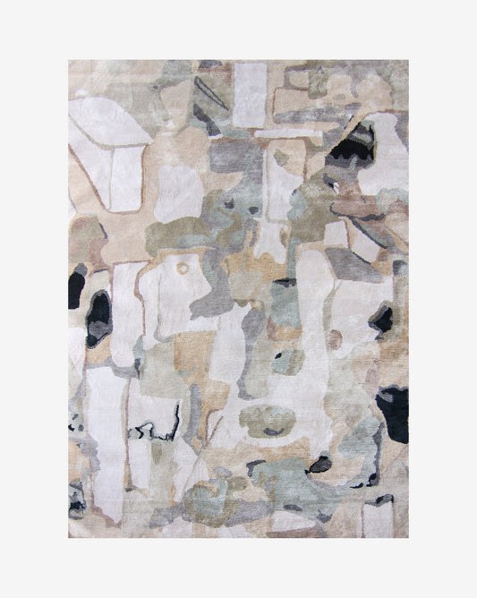 A Medina Hand Knotted Rug Blanca with a lot of different shapes and colors from Medina