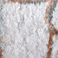 A close up of a white and brown Portico Hand Knotted Rug||Sol by Eskayel studio.