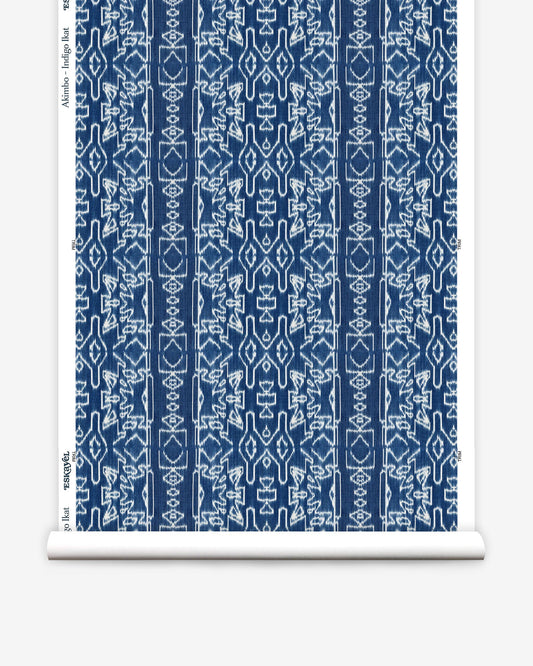 A luxurious roll of Akimbo Wallpaper Indigo Ikat with a blue and white graphic geometric pattern