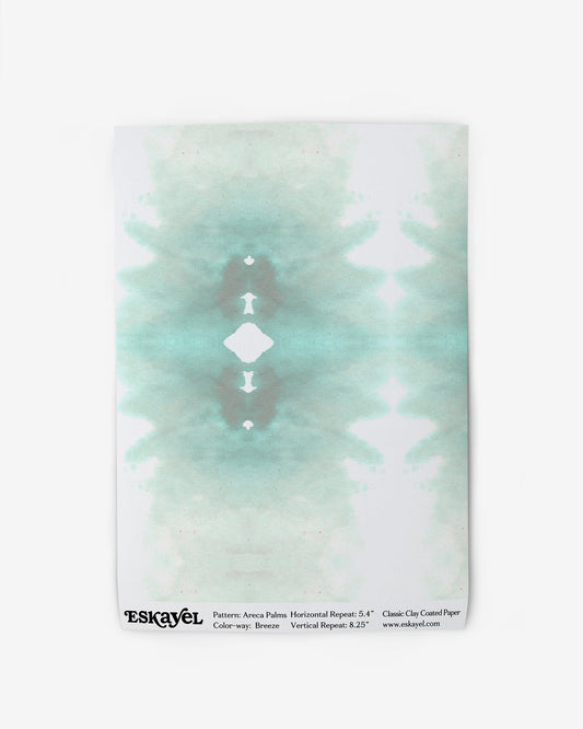 An Areca Palms Wallpaper Sample Breeze with a teal and white watercolor design on wallpaper is available for sample orderon wallpaper