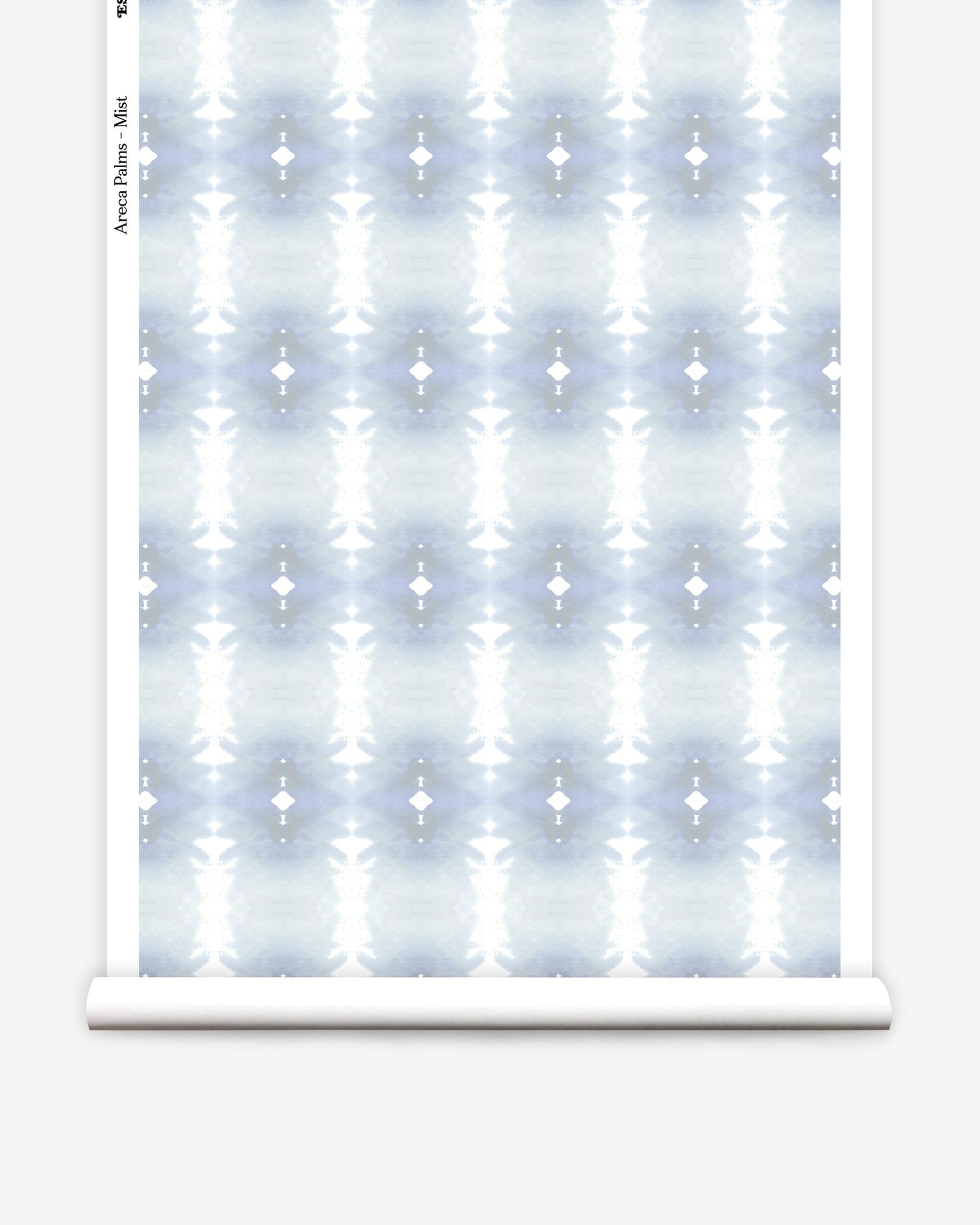 A blue and white pattern on a roll of Areca Palms Wallpaper in the Mist colorway
