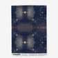 A blue and white Astral Wallpaper Night with stars from the Astral Jangala Collection