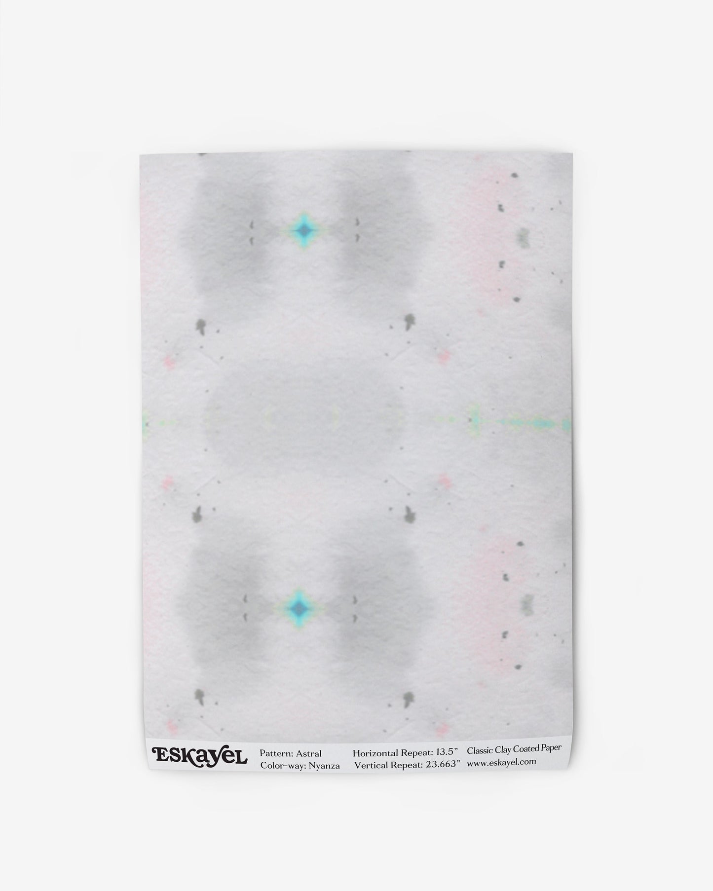 A white wallpaper with a pink, green, and blue pattern on it
Product Name: Astral Wallpaper Sample