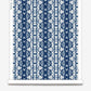 A blue and white damask pattern on a roll of paper with high-end Bali Stripe Wallpaper||Indigo Ikat.