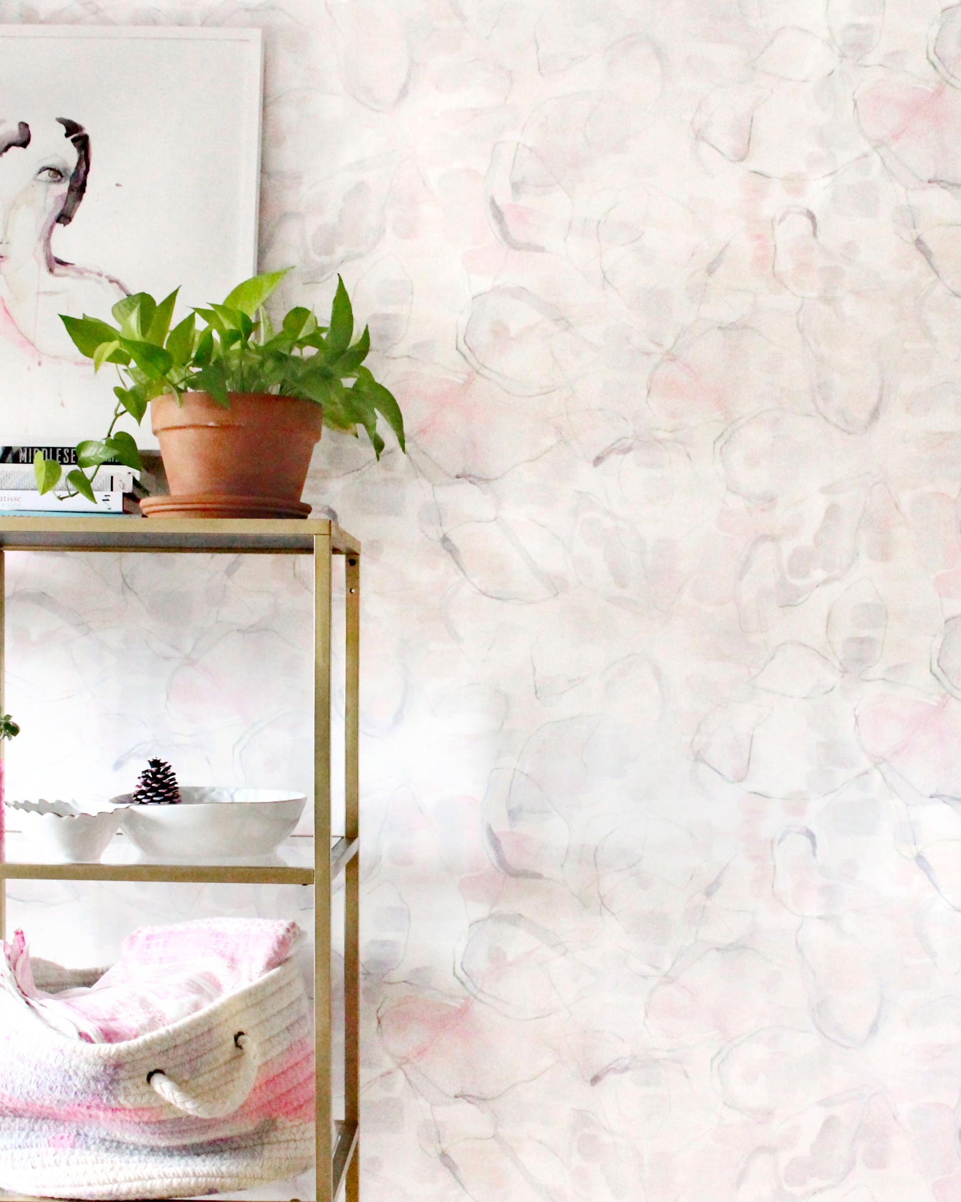 A room with Canopy Wallpaper Cameo luxury fabric and a plant on a shelf