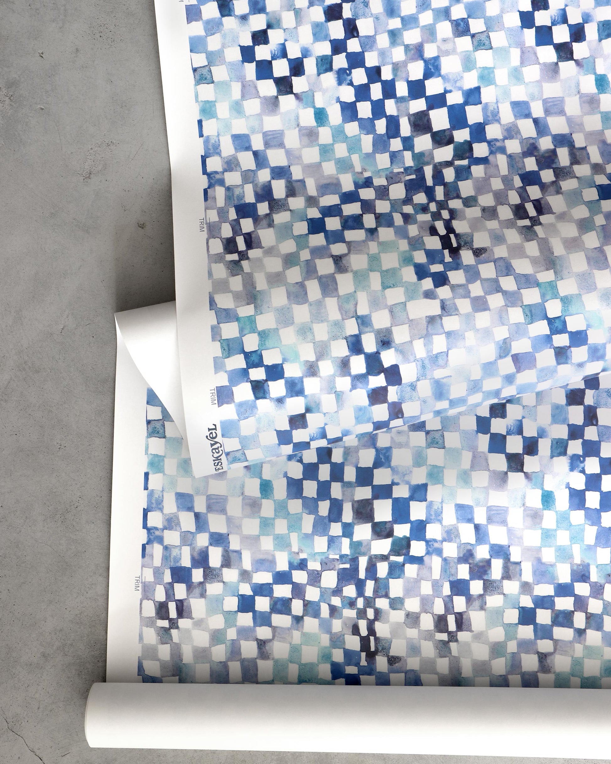 A Chess Wallwallpaper Ocean checkered pattern on a roll of wallpaper