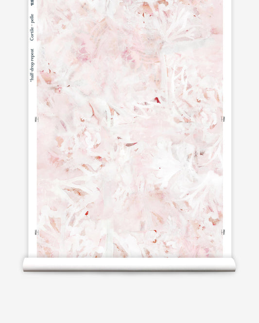A pink and white floral Cortile Wallpaper Pelle on wallpaper