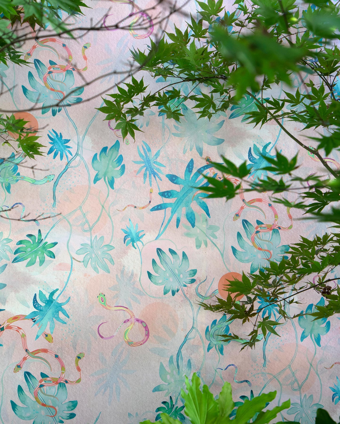A pink and blue Edera Wallpaper Stucco with a chinoiserie-inspired motif on a wall