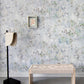 A bench in front of a Cortile Wallpaper Aqua wall