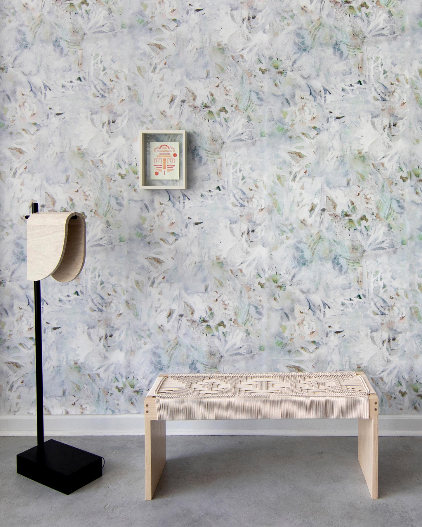 A bench in front of a Cortile Wallpaper Aqua wall
