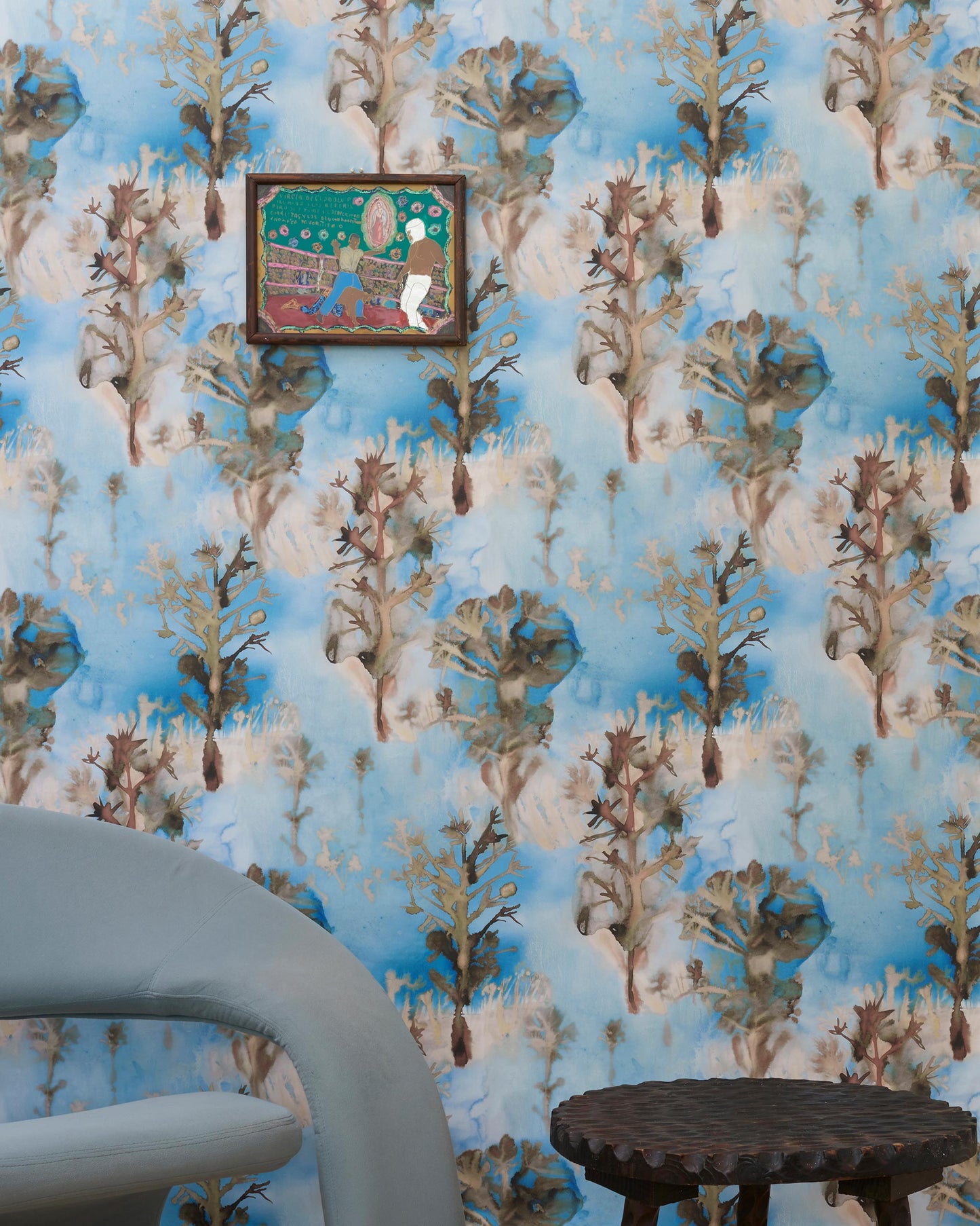 A chair in front of a wall with Aionas Wallpaper Morea
