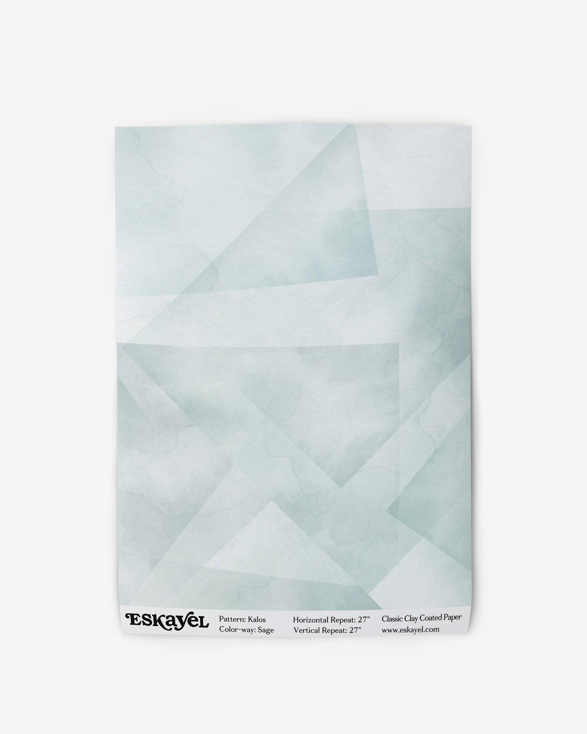 A white Kalos Wallpaper Sage with a geometric pattern on it