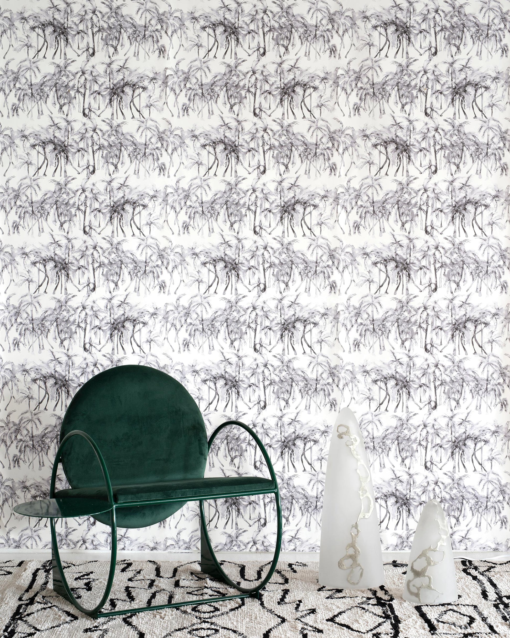 A black and white Palm Dance Wallpaper||Shadow pattern in front of a green rocking chair.