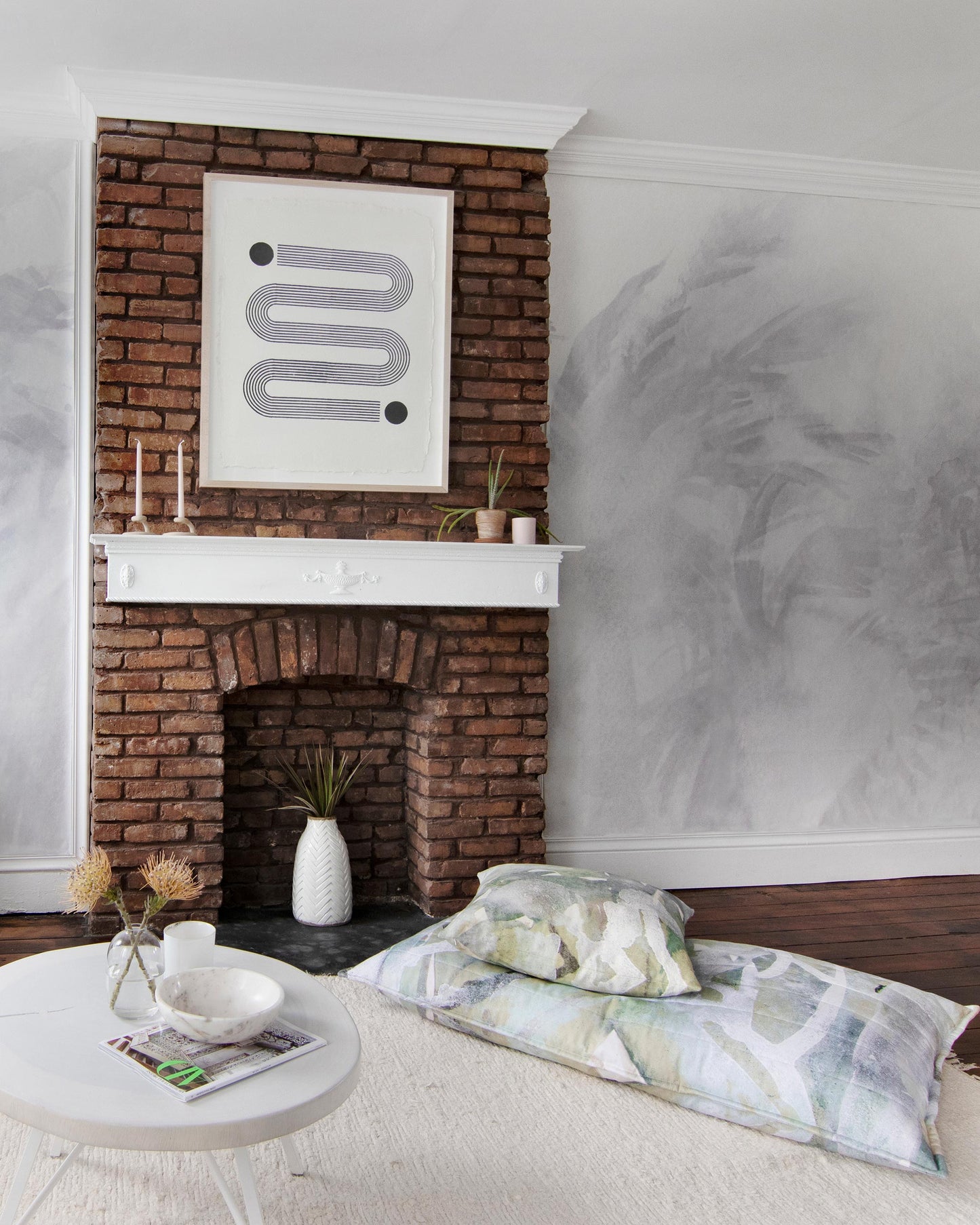 A living room with a Reflettere Wallpaper Mural||Alba.
