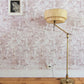 A floor lamp in a room with Souk Wallpaper||Pausa.