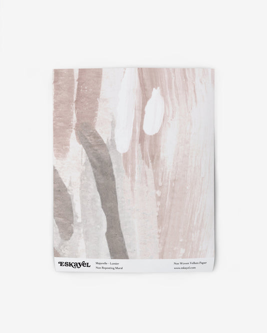 a sample of the Majorelle Wallpaper Sample Lumier description:a napkin witha white backgroundanda pinkand beige designon wallpaper
