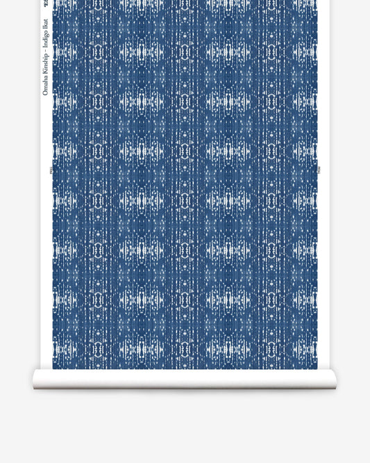 A high-end pattern from Eskayel's Omaha Kinship Wallpaper on a roll of Indigo Ikat fabric