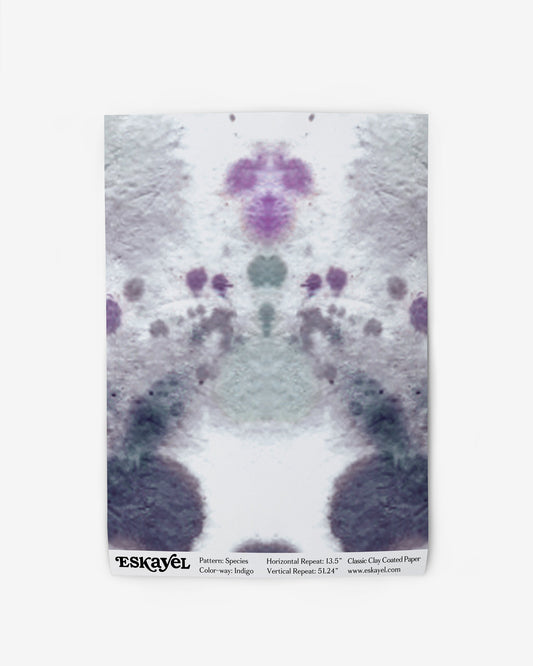 A purple and green abstract design on a white wallpaper for an Species Wallpaper Sample Indigo Order