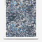 A blue and grey graphic pattern on a roll of Stele Wallpaper Perigean