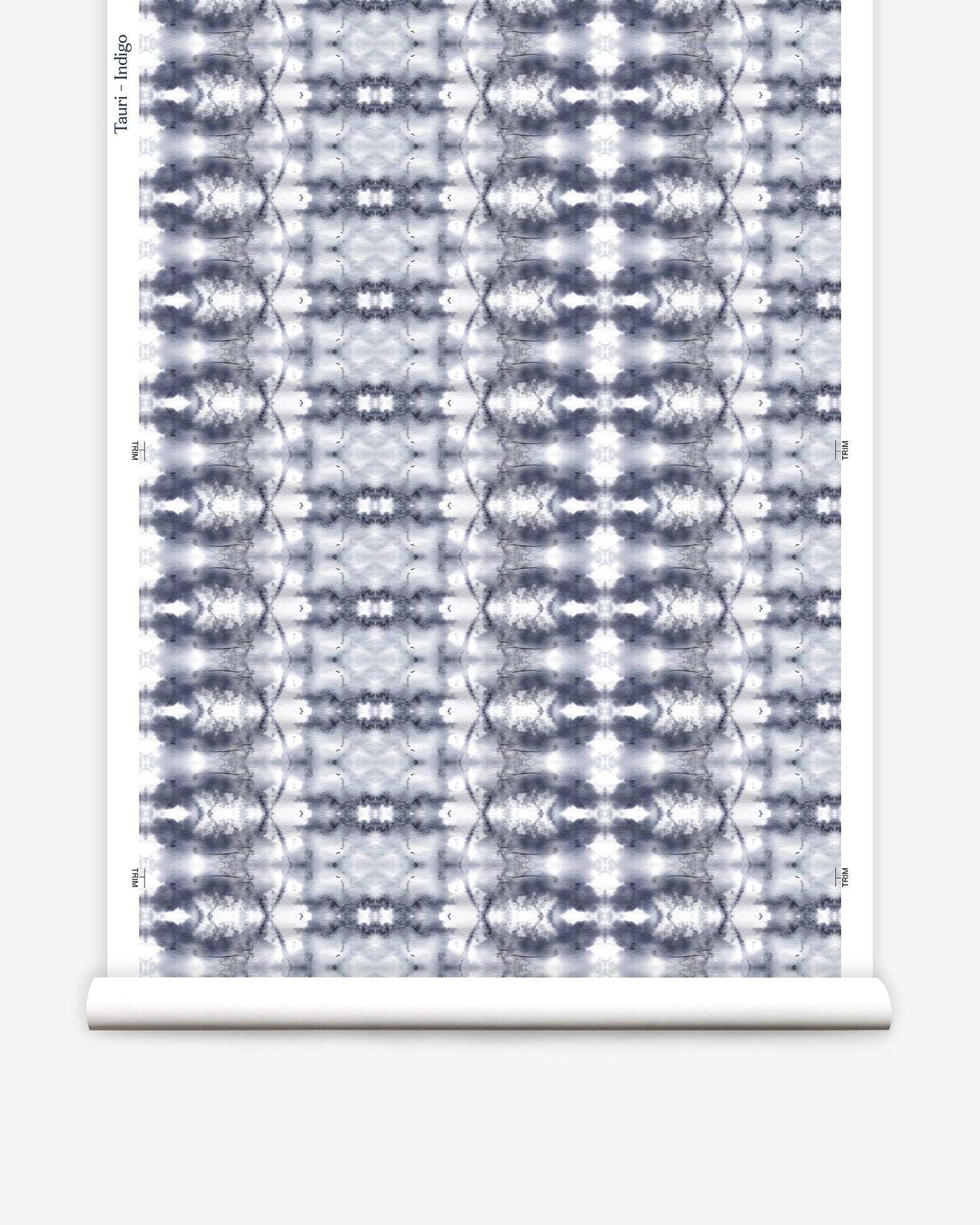 A blue and white pattern on a roll of Tauri Wallpaper Indigo