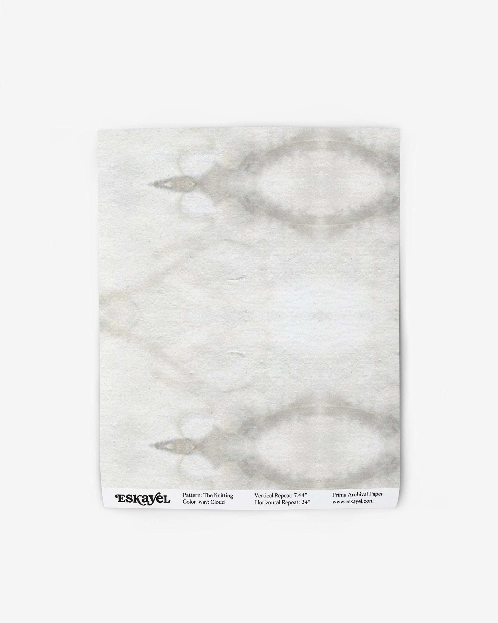 A white wallpaper with a marble pattern from The Knitting Wallpaper Cloud Collection