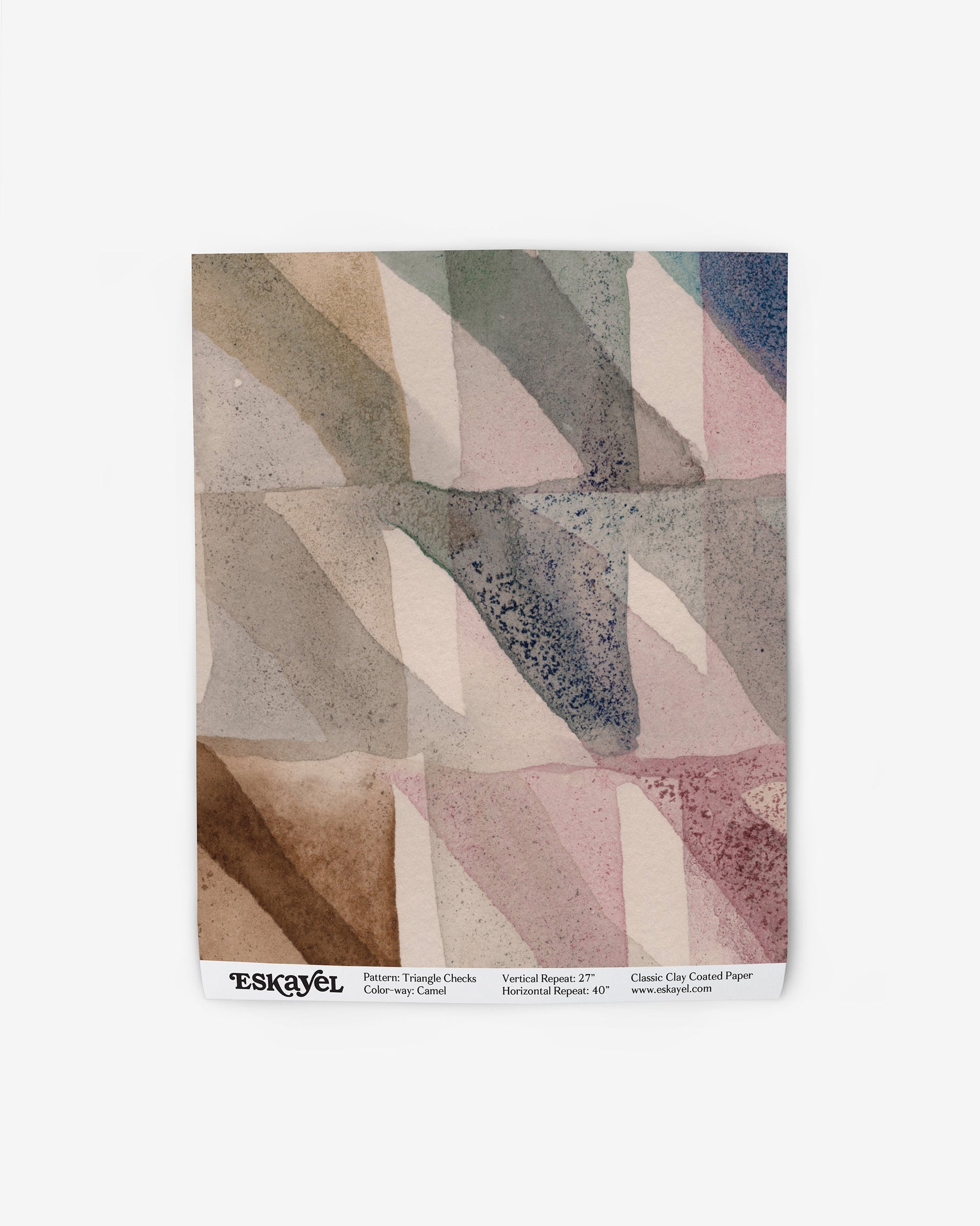 A blanket with a geometric pattern of Triangle Checks Wallpaper||Camel.