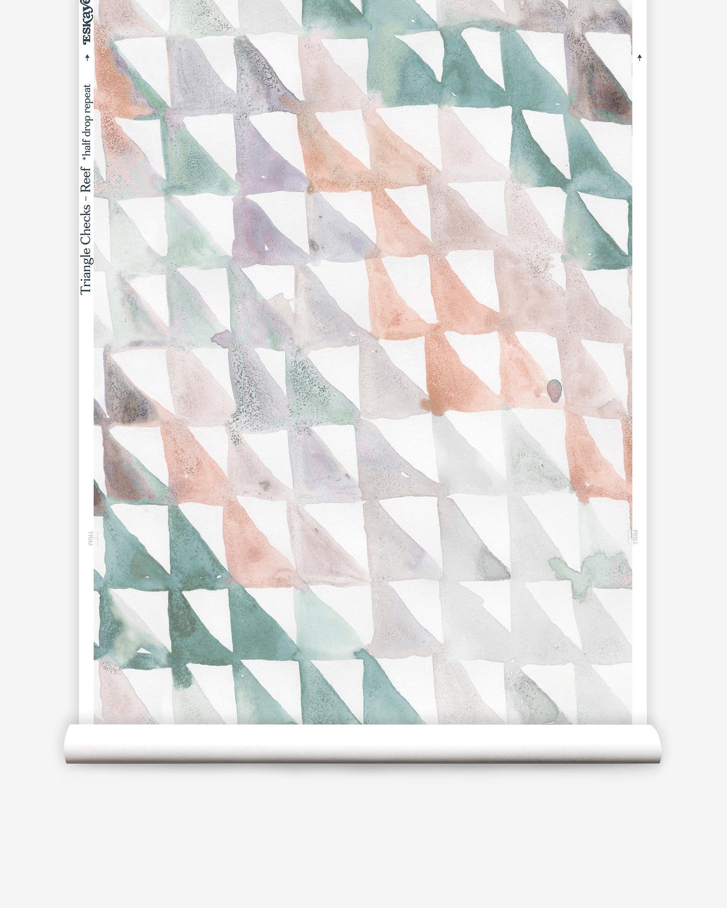 A roll of Triangle Checks Wallpaper||Reef with a watercolor pattern in the Triangle Checks colorway.