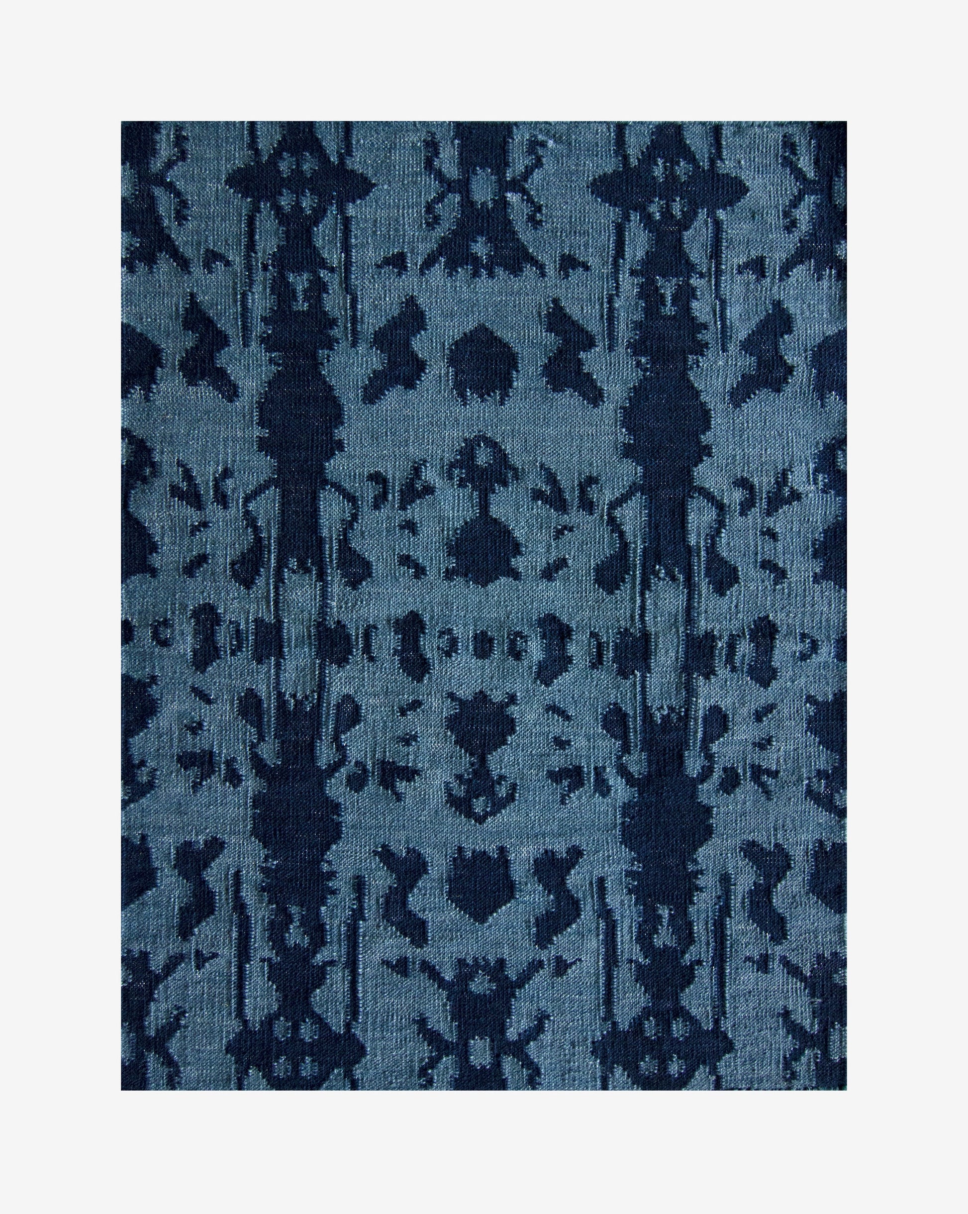 A Biami Flatweave Rug Deep Indigo colorway with a Biami pattern