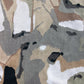 A close up of a Medina Flatweave Rug made from camouflage fabric