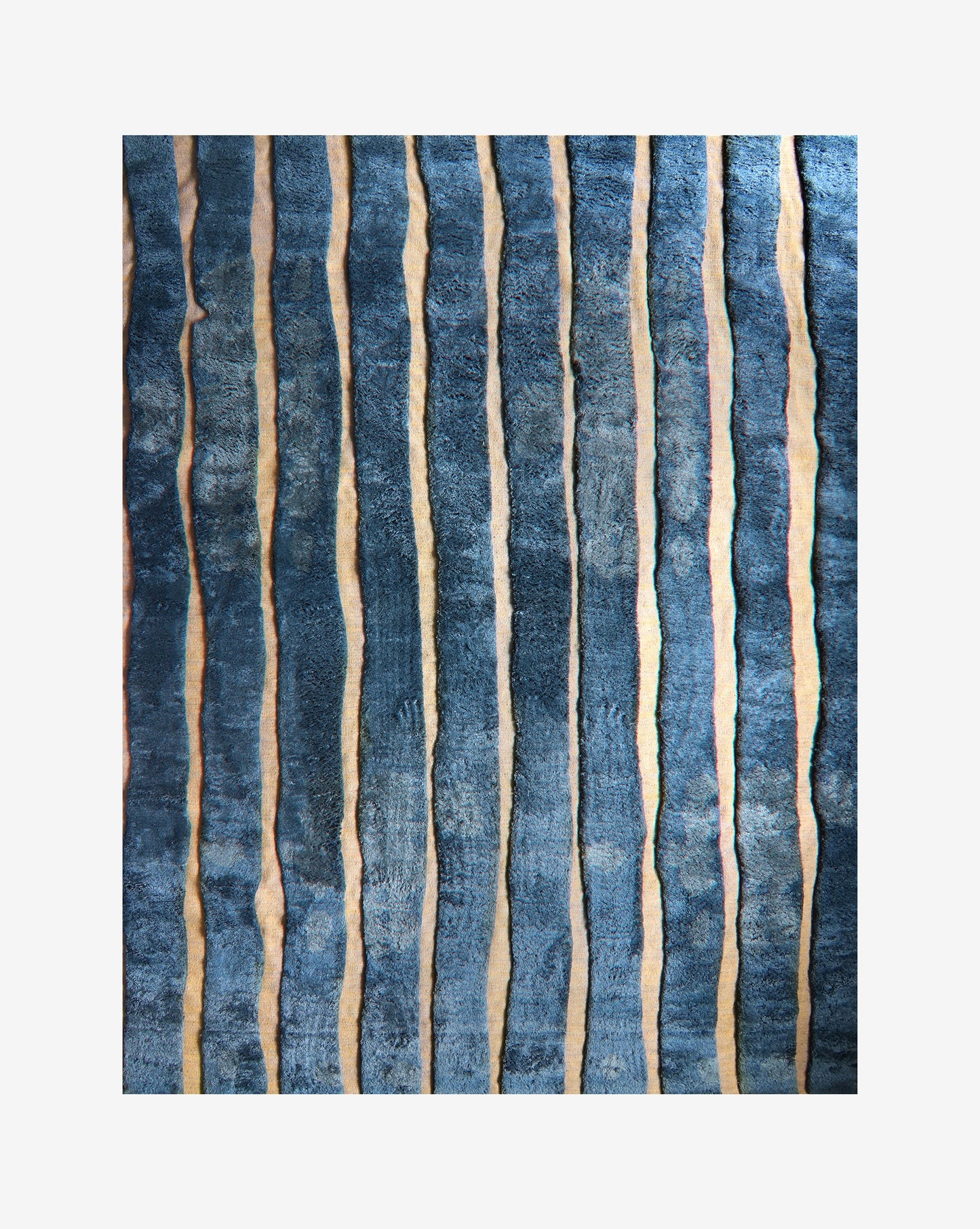A Bold Stripe Hand Knotted Rug Thalassa, created using hybrid weaving techniques