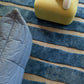 A blue rug with a Bold Stripe Hand Knotted Rug Thalassa