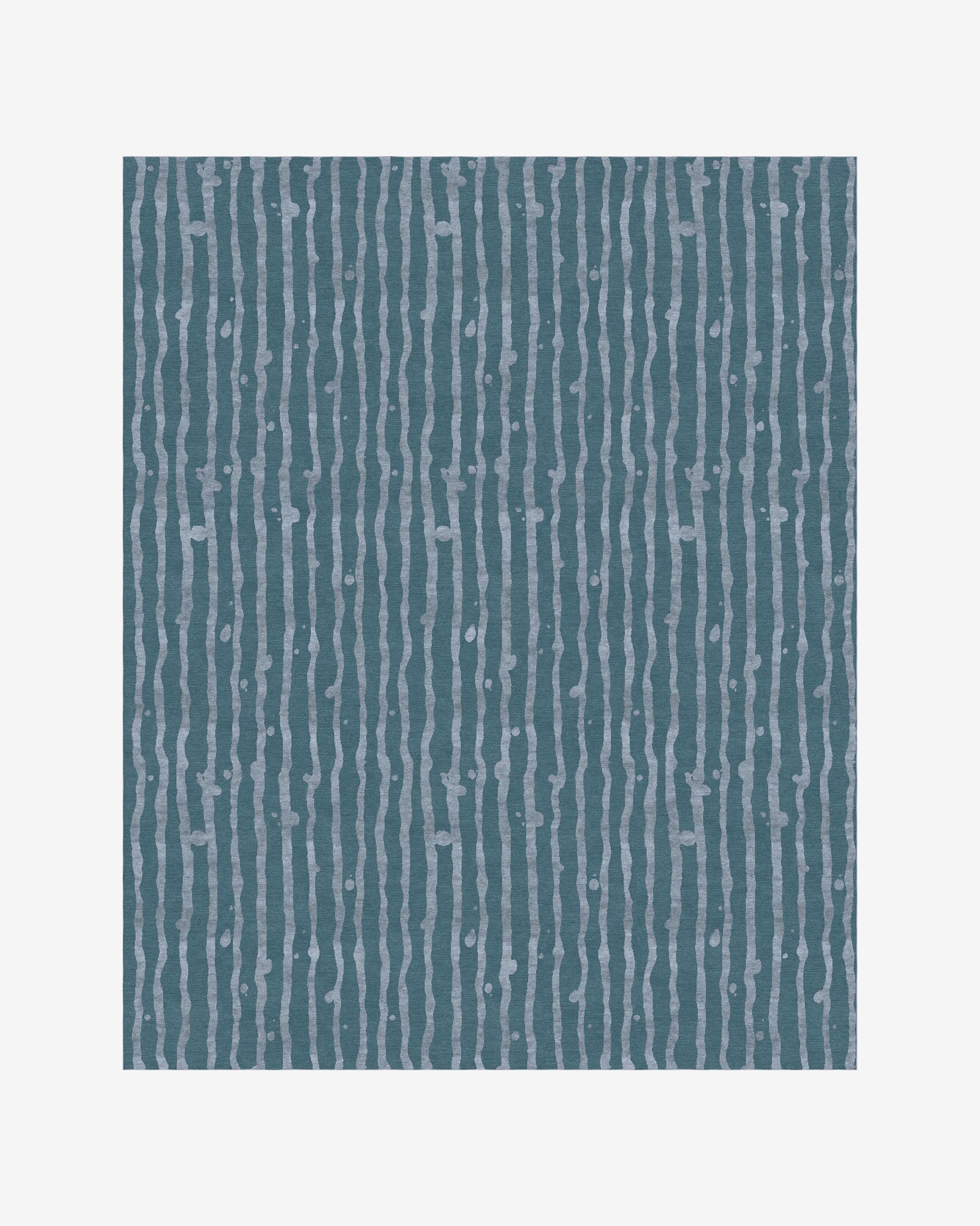 An image of the Drippy Stripe Hand Knotted Rug Gulf with an aquatic feeling