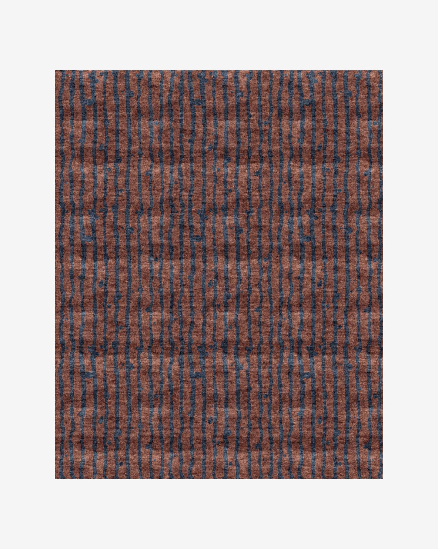A Drippy Stripe Hand Knotted Rug Isthmus with a bold blue pattern