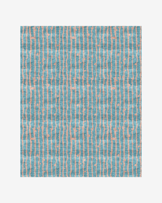A Drippy Stripe Hand Knotted Rug||Morea with a blue and pink striped pattern on a white background.