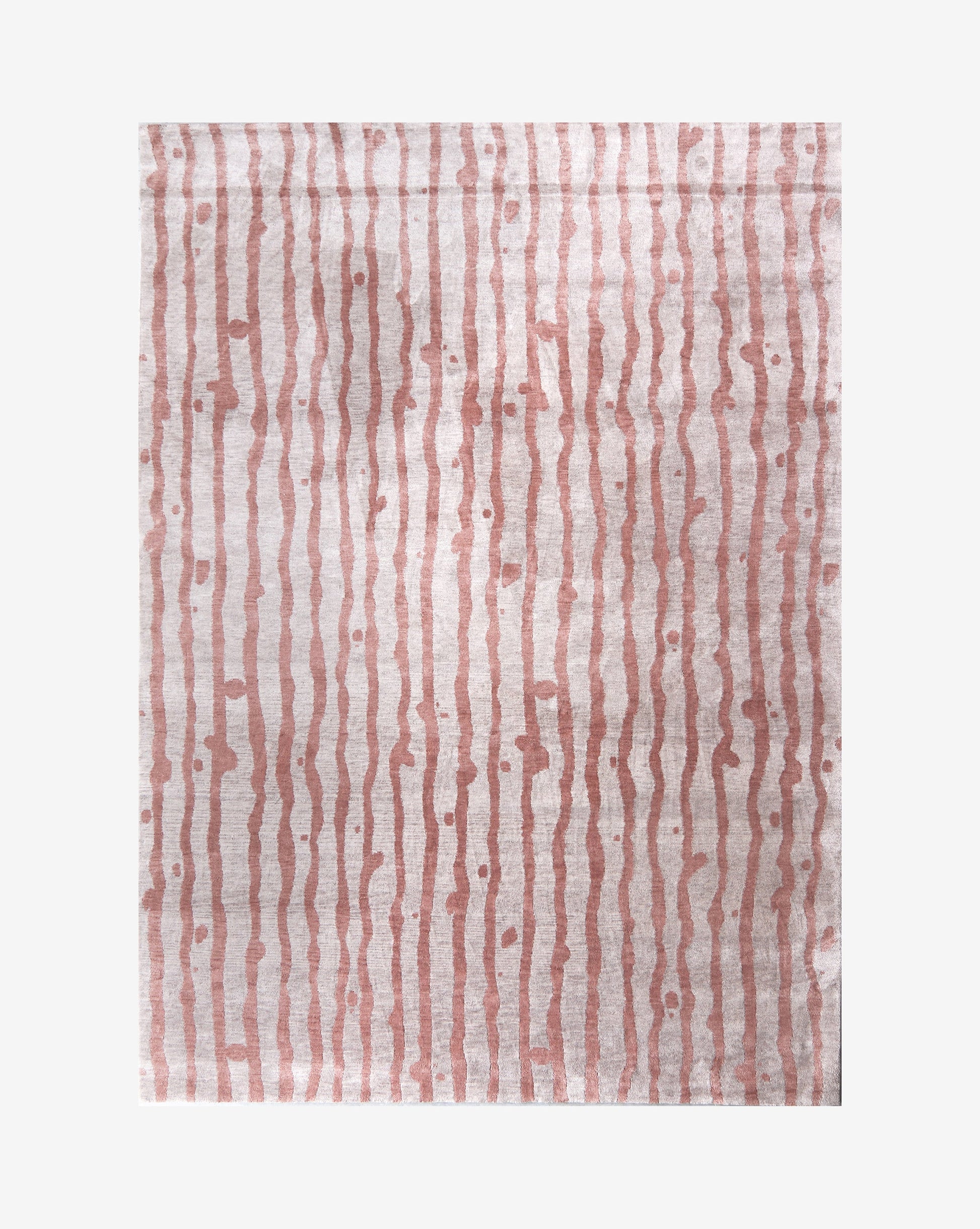 A Drippy Stripe Hand Knotted Rug  Sienna with bold colors on a white background