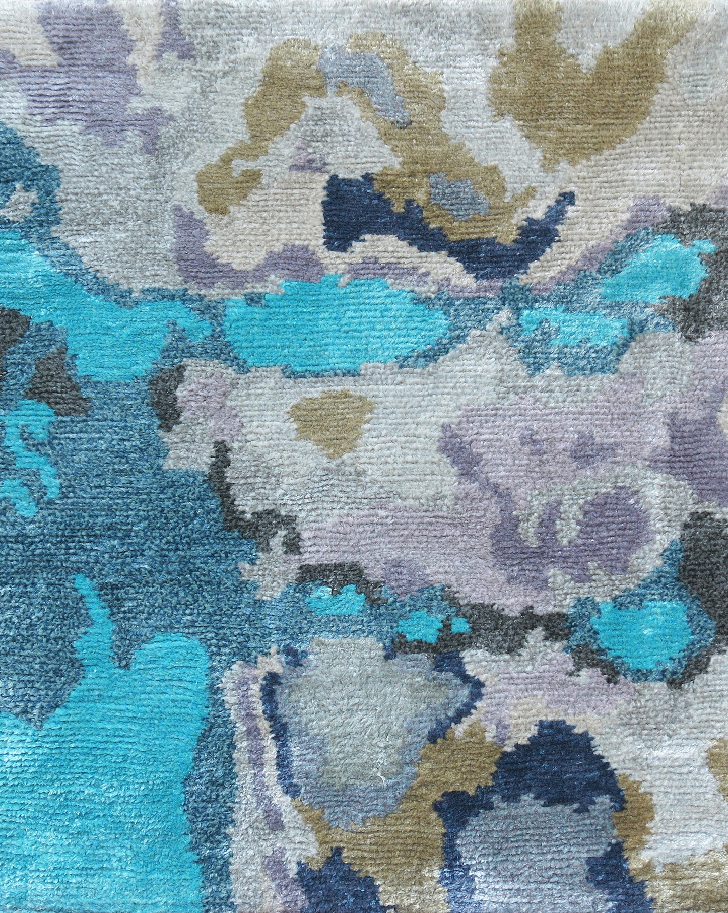 A blue and grey Expo Hand Knotted Rug Multi with abstract shapes from the Presidio Collection