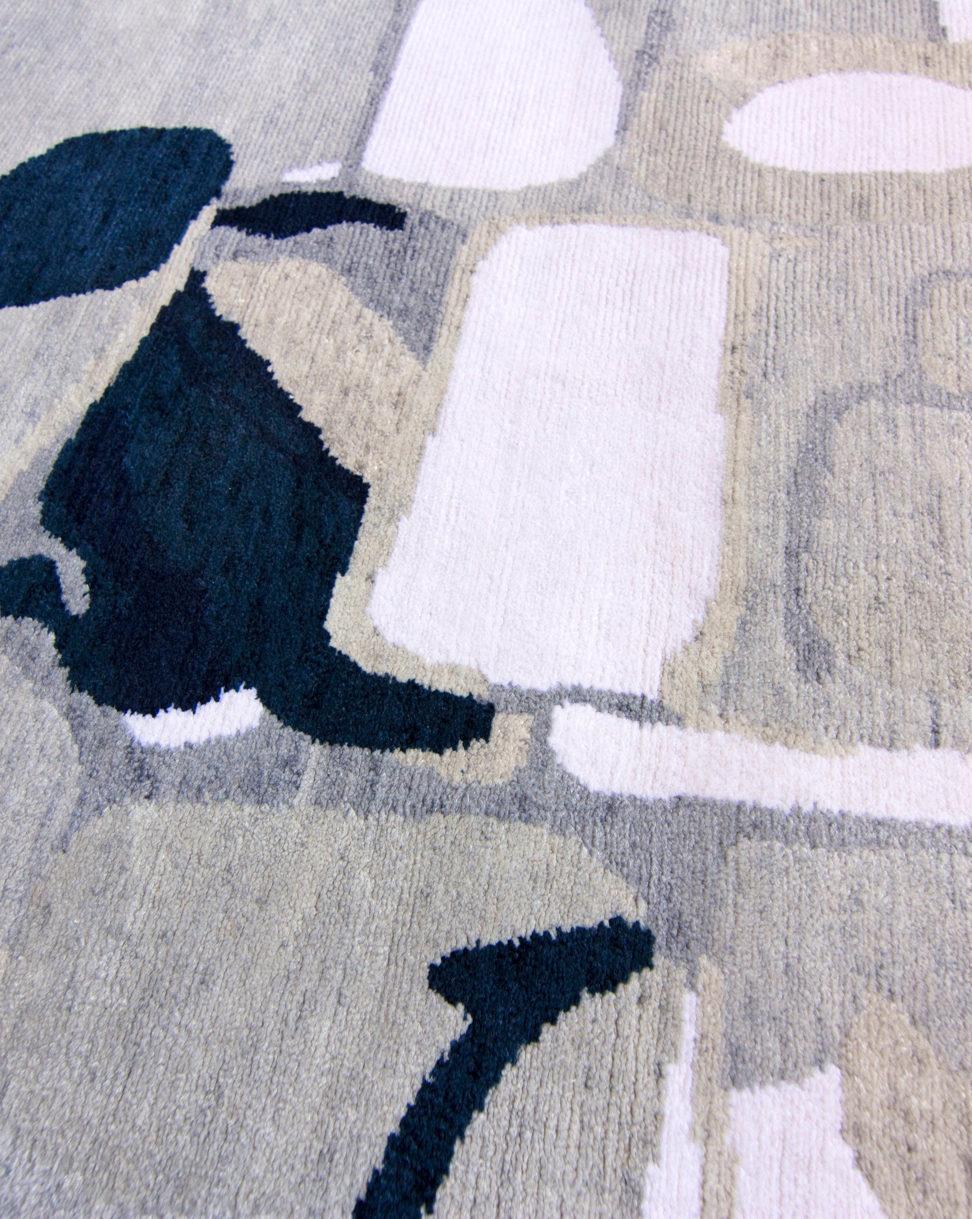 A close up of a Medina Hand Knotted Rug Cyrrus