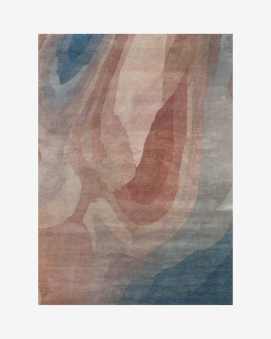 A Progressions Hand Knotted Rug from the Progressions Collection, featuring an abstract design in blue, pink, and brown colorway.