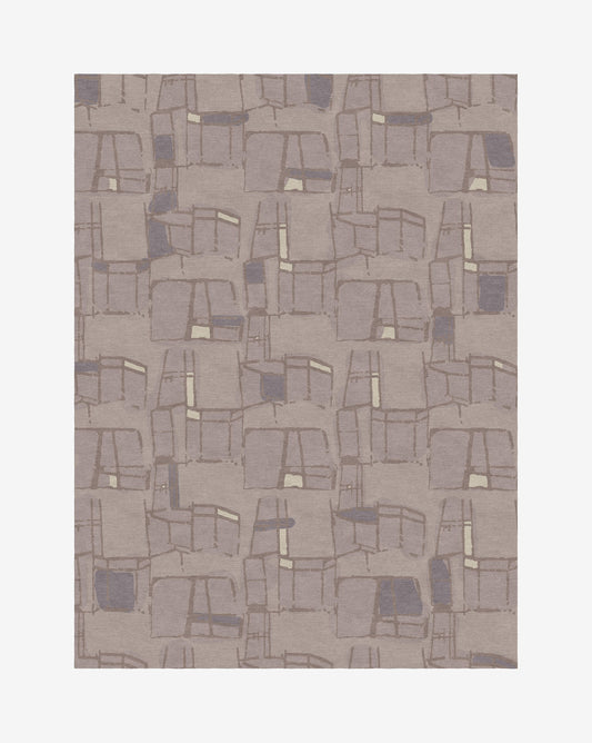 A grey and beige pattern on a white background, created through the Quotidiana Hand Knotted Rug||Morea design process.