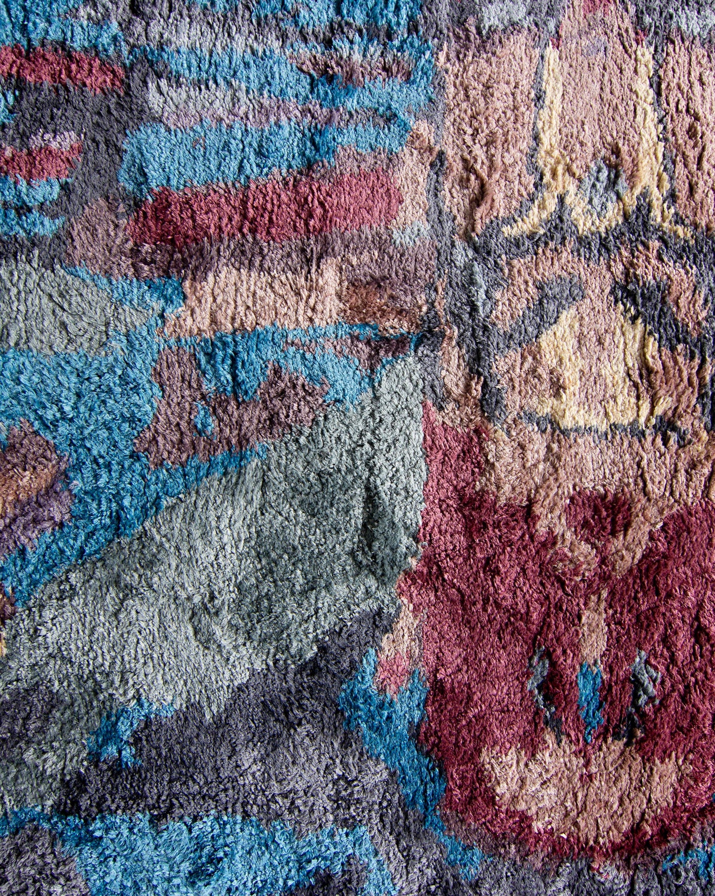 A close up of a Tamandot Hand Knotted Rug with a traditional carpet design