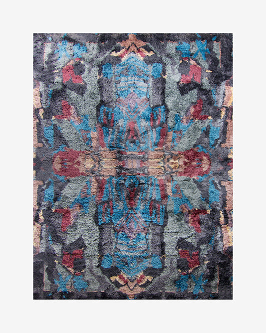 A Tamandot Hand Knotted Rug with a traditional carpet design featuring blue and red colors